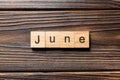 June word written on wood block. June text on wooden table for your desing, Top view concept Royalty Free Stock Photo