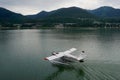 Juneau, Alaska: A float plane prepares to take off from the waters of the Gastineau Channel Royalty Free Stock Photo