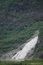 Juneau, Alaska: Tourists stand near a spectacular waterfall