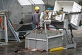 Juneau, Alaska: A worker at the Macaulay Salmon Hatchery Royalty Free Stock Photo