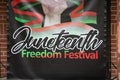 Juneteenth Freedom Festival Sign at a local Festival