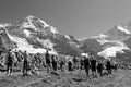 Marathon sport event at the train station Kleine Scheidegg in front of the MÃÂ¶nch and Jungfrau in the swiss alps Royalty Free Stock Photo