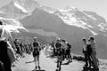 Thousands of people at the Jungfrau-Marathon sport event at Kleine Scheidegg in front of the MÃÂ¶nch and Jungfrau