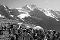 Thousands of people at the Jungfrau-Marathon sport event at Kleine Scheidegg in front of the MÃÂ¶nch and Jungfrau