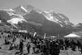 Thousands of people at the Jungfrau-Marathon sport event at Kleine Scheidegg in front of the MÃÂ¶nch and Jungfrau