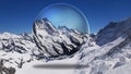 Jungfrau snow mountain scenery in a glass ball Royalty Free Stock Photo