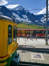 Jungfrau, Switzerland - August 19, 2019: Beautiful view of the alpine valley in the Jungfrau region. The train is at the railway