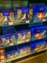 Jungfrau, Switzerland - August 19, 2019: Lindt chocolate shop in Jungfraujoch station. On the shelf are many bright boxes of Swiss