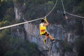 Jungle Adventure stock photo. Zipline in the forest. Beautiful view from zip line. Riding on a zip line. Zip line in adventure par