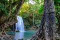 Jungle landscape with flowing blue water of Erawan waterfall Royalty Free Stock Photo