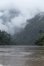 jungle, mountains and the Nam Ou river in northern Laos, vertical