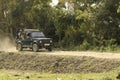 jungle safari tourist vehicle moves inside the reserve forest