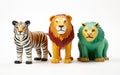 A Jungle Scene with Toy Wild Animals: Lion, Tiger, and Elephant Set -Generative Ai