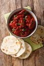 Junglee Maas is a traditional Rajasthani recipe, slowly stewed meat in a spicy sauce close-up. Vertical top view