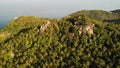 Jungles and mountains of tropical island. Drone view of green jungles and huge boulders on volcanic rocky terrain of Koh Tao Royalty Free Stock Photo