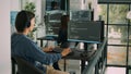Junior developer programming code on terminal window, typing server information
