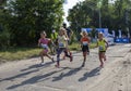 Junior female athletics runner. Running race competition