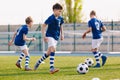 Junior Football Players Making Sports Training, Happy Boys on Soccer Practice Session on Summer Time Royalty Free Stock Photo