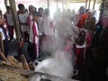 Junior High School students look enthusiastic as they learn to make Javanese sugar made from coconut tree sap. Royalty Free Stock Photo