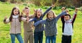 Junior school girls and boys spending time together Royalty Free Stock Photo