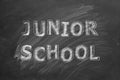 Junior school. Text on blackboard Royalty Free Stock Photo