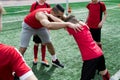 Junior Team Stretching during Practice Royalty Free Stock Photo