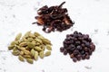 Juniper berries, green cardamom and hibiscus flower