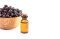 Juniper Berry Essential Oil Isolated on a White Background