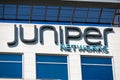 Juniper Networks logo atop modern headquarters in Silicon Valley