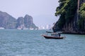 Junk boat sailing  on Ha Long bay Royalty Free Stock Photo