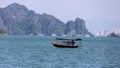 Junk boat sailing  across Ha Long bay, Vietnam Royalty Free Stock Photo