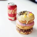 Junk food concept with Coca Cola drink and donut