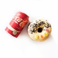 Junk food concept with Coca Cola drink and donut Royalty Free Stock Photo