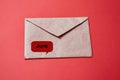 Junk mail or spam and fake letter idea. Concept for unsolicited mail or e-mail. Envelope on red background Royalty Free Stock Photo