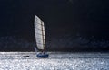 Junk rigged cruising sailboat. Royalty Free Stock Photo