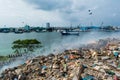 Junk yard zone view full of smoke, litter, plastic bottles,rubbish and trash at the Thilafushi local tropical island Royalty Free Stock Photo