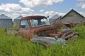 Junked truck in abandoned farmstead