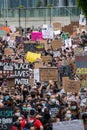 Junteenth Protestors holding up signs during anti-racism march. Vancouver BC Canada