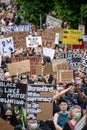 Junteenth Protestors holding up signs during anti-racism march. Vancouver BC Canada