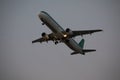 30 Juny 2016 Faro, Portugal. Passenger plane fly up over take-off runway from airport at sunset. Plane departure from airport.