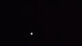 Jupiter and its moons, moving. Long lens.
