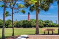 Jupiter lighthouse at sunny summer day and palm trees around, West Palm Beach, Florida Royalty Free Stock Photo