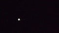 Jupiter with 4 moons, moving as earth turns.