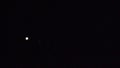 Jupiter 4 moons moving dark. speeded 4x.