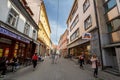 Jurciceva Ulica street with people passing by boutiques and shops in Maribor. Royalty Free Stock Photo