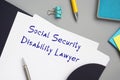 Juridical concept meaning Social Security Disability Lawyer with sign on the sheet