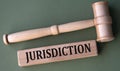 JURISDICTION - word on wooden blocks on a white background with a judge's gavel