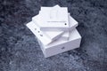 Jurmala, Latvia - 21 09 2023: Four white boxes from Apple devices are in a stack. First unboxing - AirPods pro 2