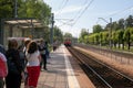 Jurmala, Latvia - May 20, 2017: People waiting for the train on the platform of railway station. Royalty Free Stock Photo
