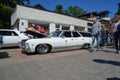 Jurmala, Latvija - 06.06.2018 Vintage classic car Old and stylish Muscle car. White rusty car